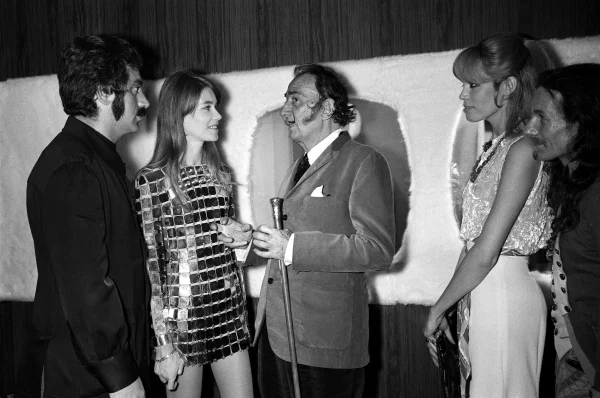 Francoise Hardy wears Paco Rabanne goldmetal dress